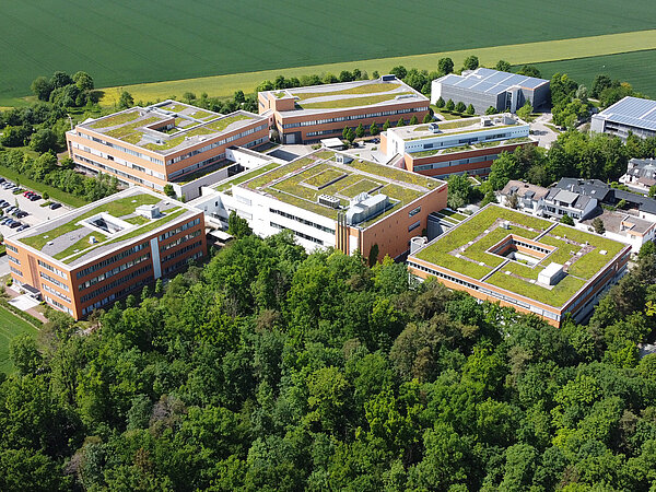 Aerial view of Schreiner Group in Oberschleißheim: The company attaches great importance to sustainability.