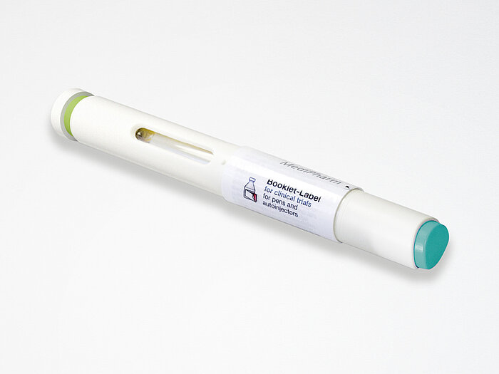 Closed booklet label on autoinjector.