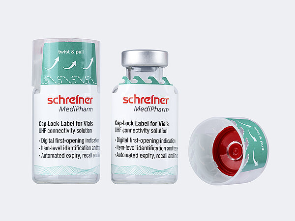 A tamper-evident security label wraps around a vial 