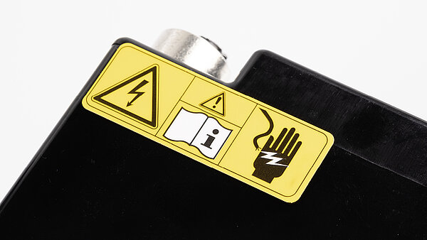 The warning signs protect against accidents with high voltage