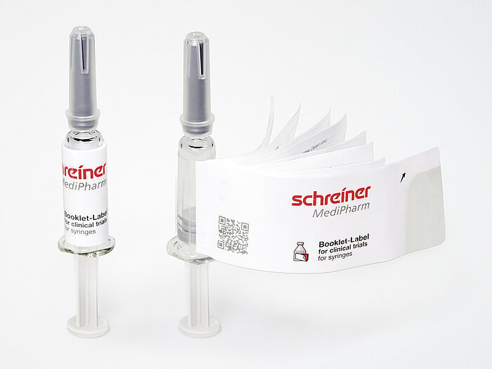 Booklet-Label closed and opened on syringe.