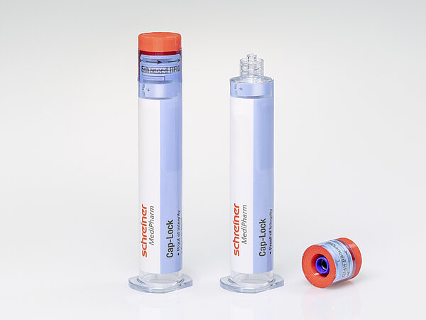 Cap-Lock by Schreiner MediPharm is a combination of safety label and cap adapter for Luer-Lock syringes.
