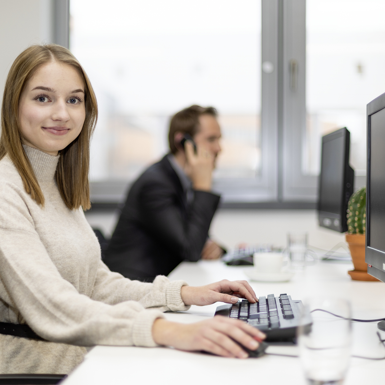 Schreiner Group employees at their workplace